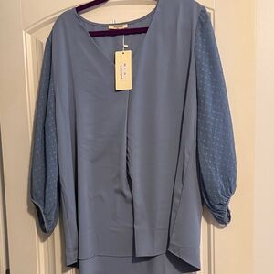 Chic Blue Blouse with Textured Sleeves